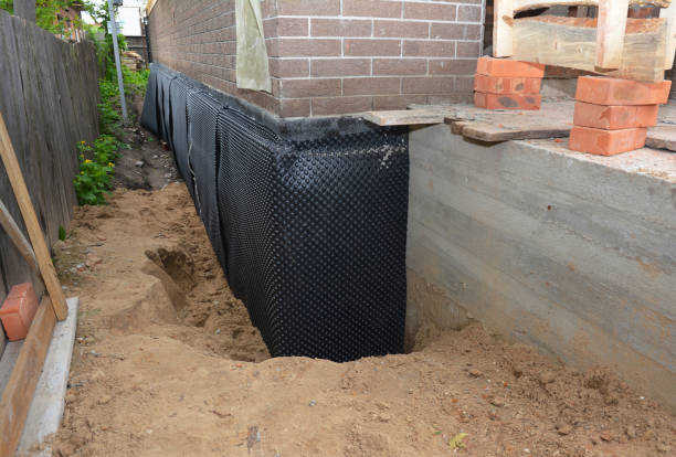 Happy homeowners after waterproofing job in Pitsburg
